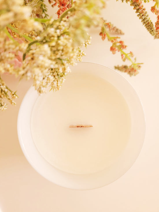 An Ebb & Flo Candle, clean and simple, using natural wax and a wooden wick