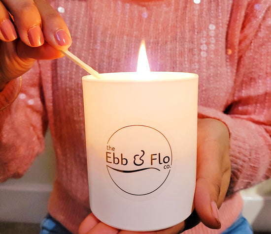 Lighting an Ebb & Flo Candle to unlock our added gift to you